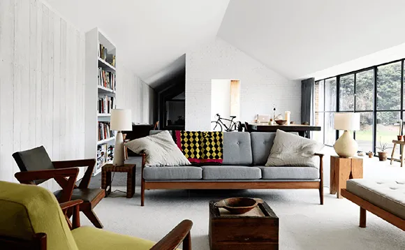 Elegant living room with pendant lights and stylish furniture for full home interior designing in Vancouver.